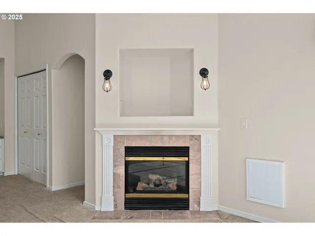 a living room with a fireplace