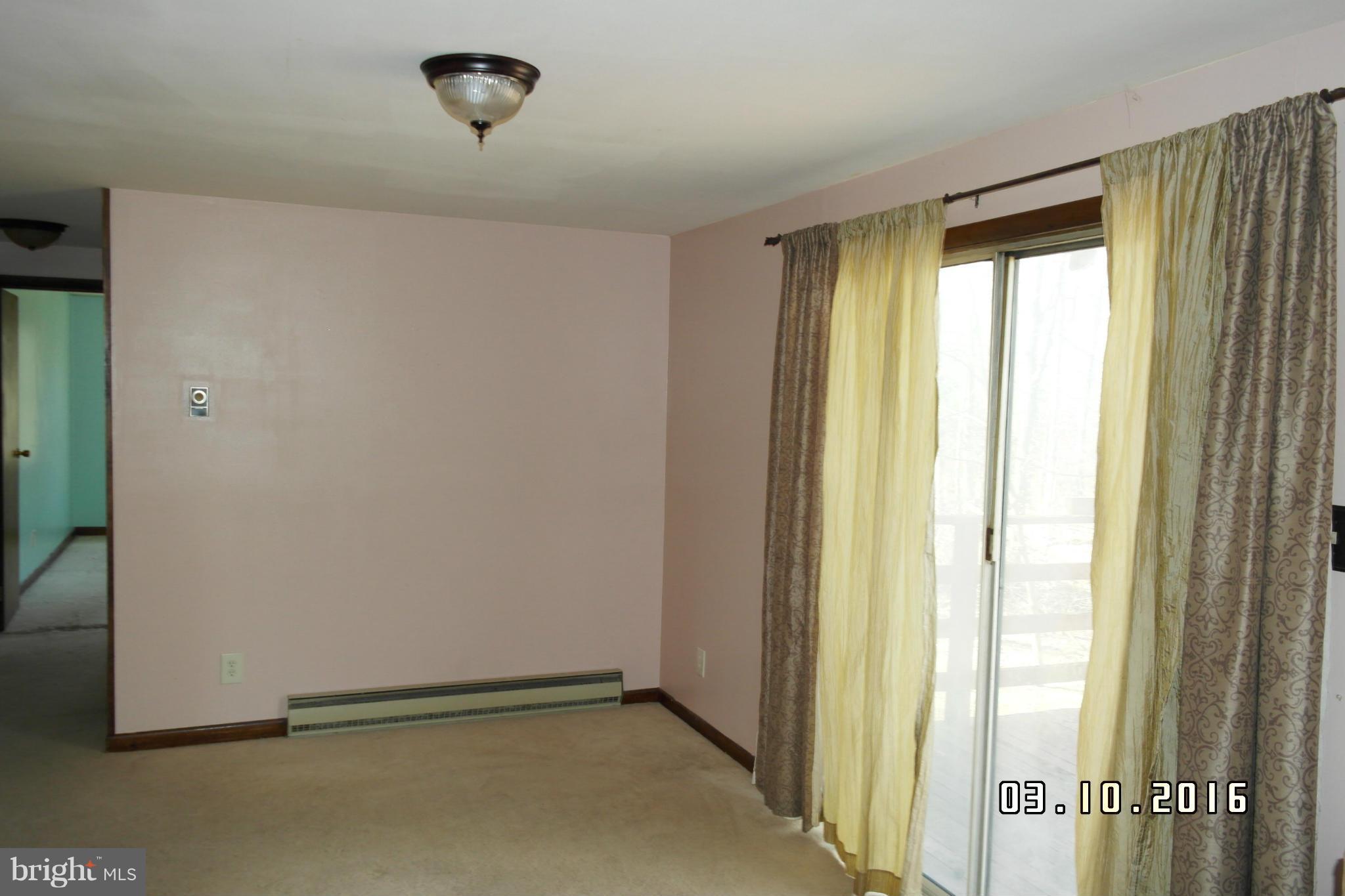 4524 Elmer Derr Road Frederick, MD 21703 - Photo 6 of 15 a view of an empty room with a window