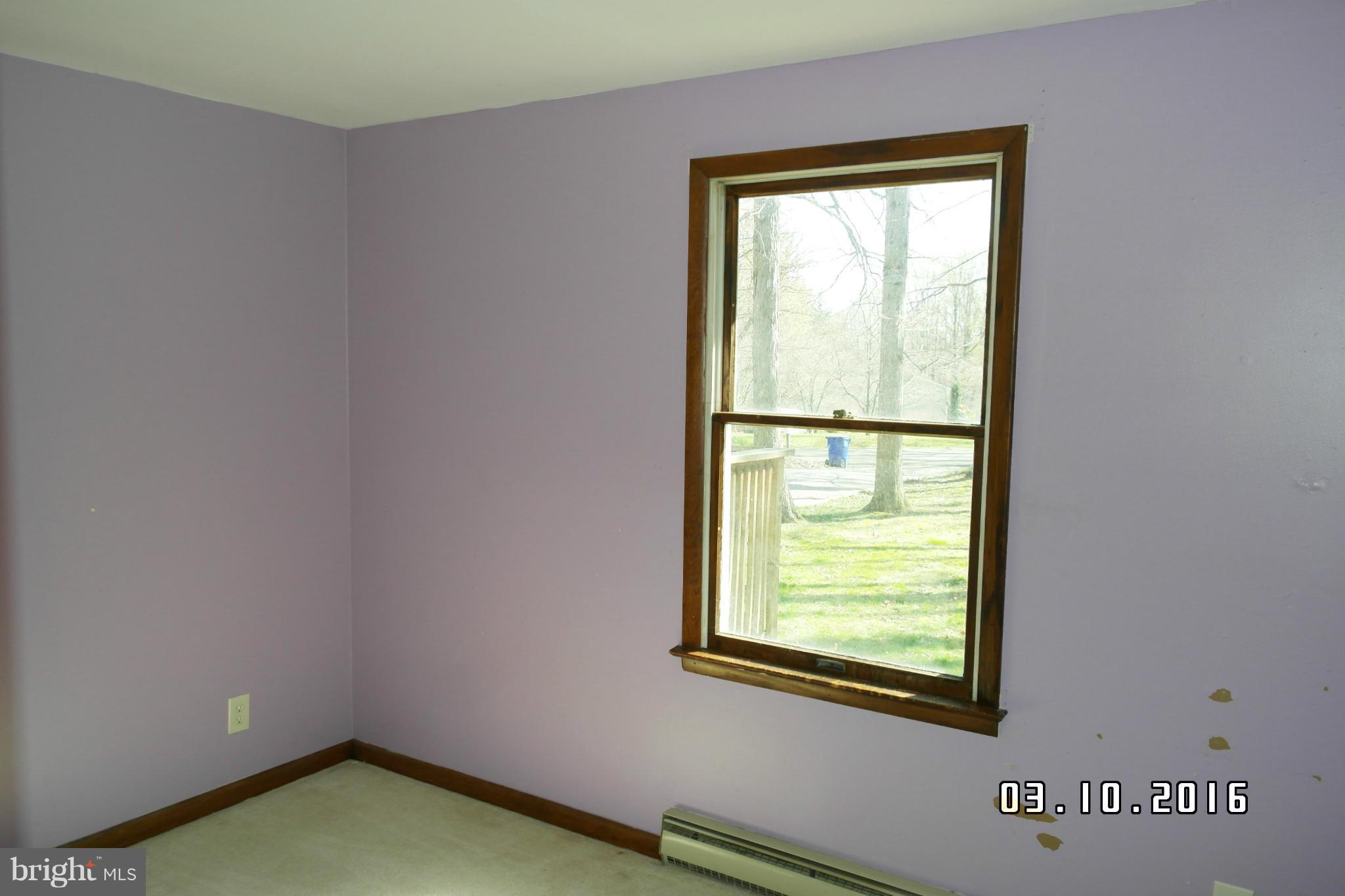 4524 Elmer Derr Road Frederick, MD 21703 - Photo 8 of 15 a view of an empty room with a window