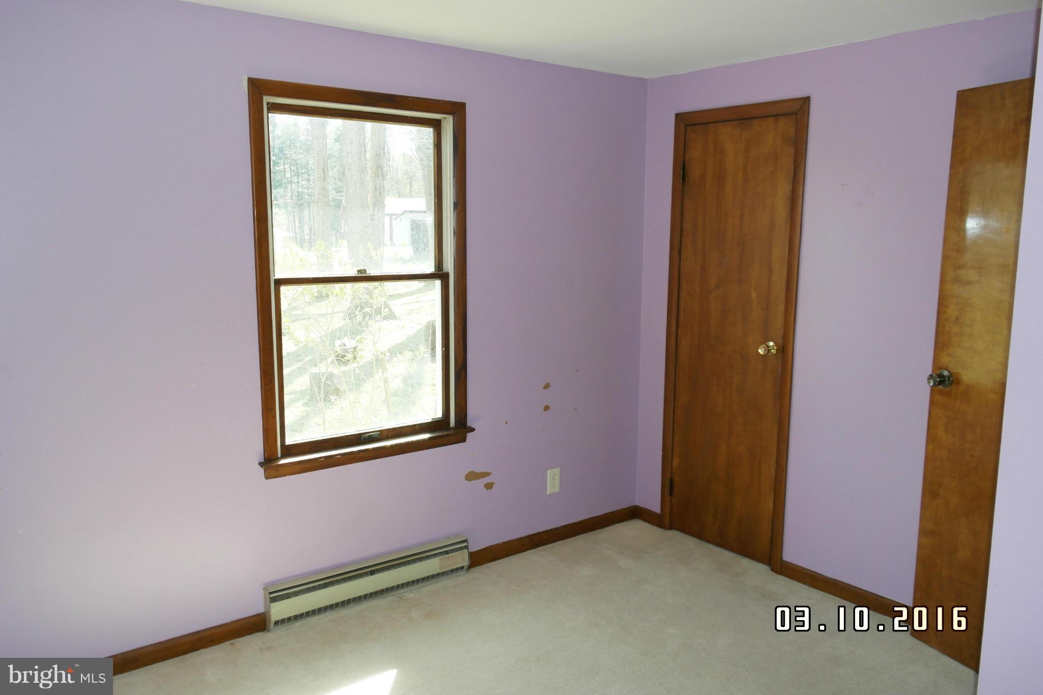 4524 Elmer Derr Road Frederick, MD 21703 - Photo 9 of 15 an empty room with windows