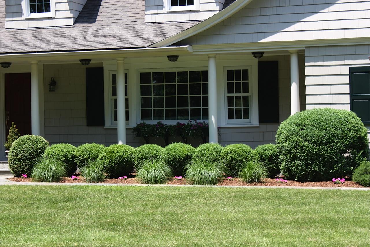 123 Brookside Road Darien, CT 06820 - Photo 3 of 39 a front view of a house with a yard