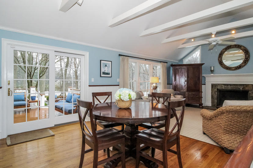 123 Brookside Road Darien, CT 06820 - Photo 9 of 39 a view of a dining room with furniture window and wooden floor