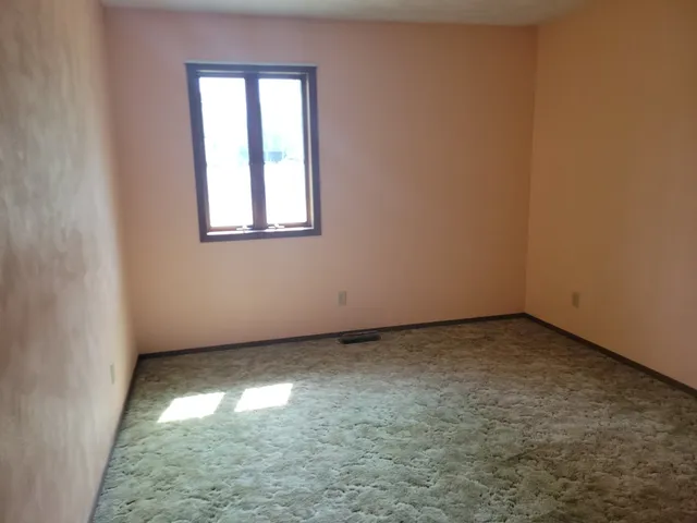 an empty room with a window