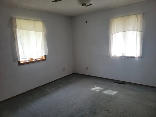 an empty room with a window