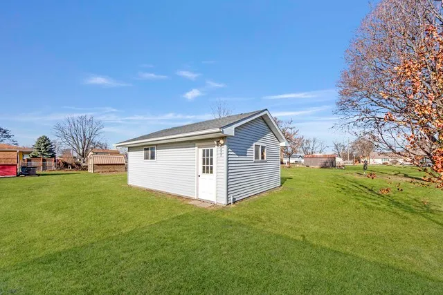 a view of a big yard next to a house