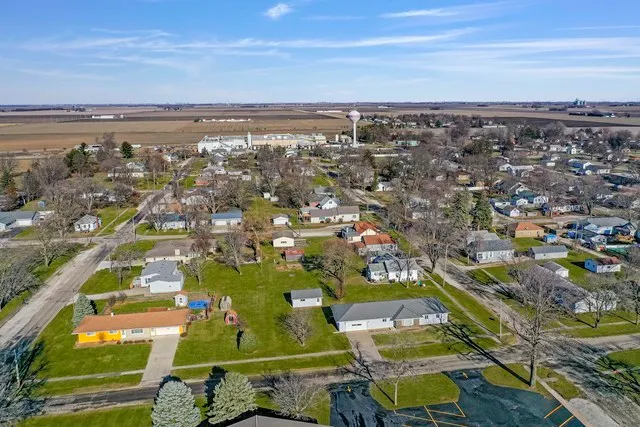 an aerial view of a pool patio swimming pool and outdoor seating