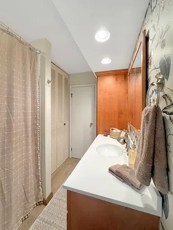 a bathroom with a sink and a mirror