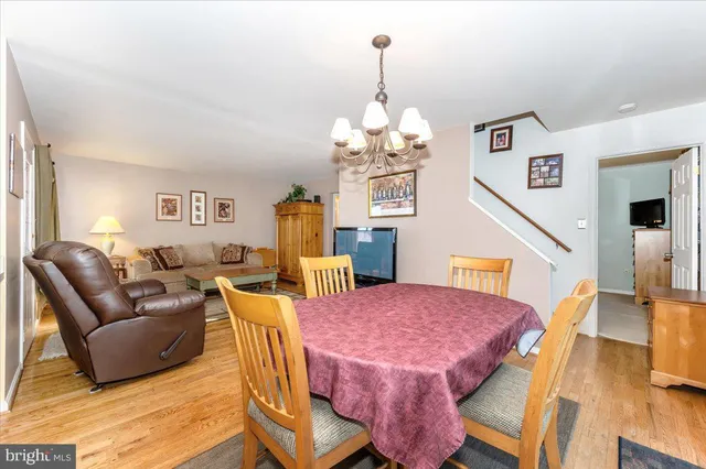 a kitchen with cabinets a sink and appliances