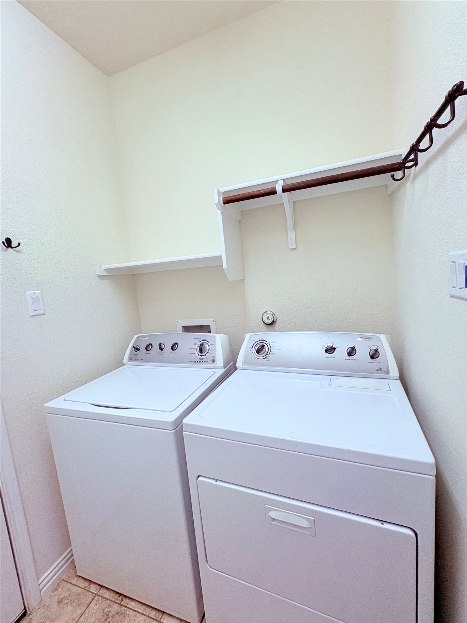 16029 Hampton Bliss Trace Austin, TX 78728 - Photo 7 of 15 a utility room with dryer and washer
