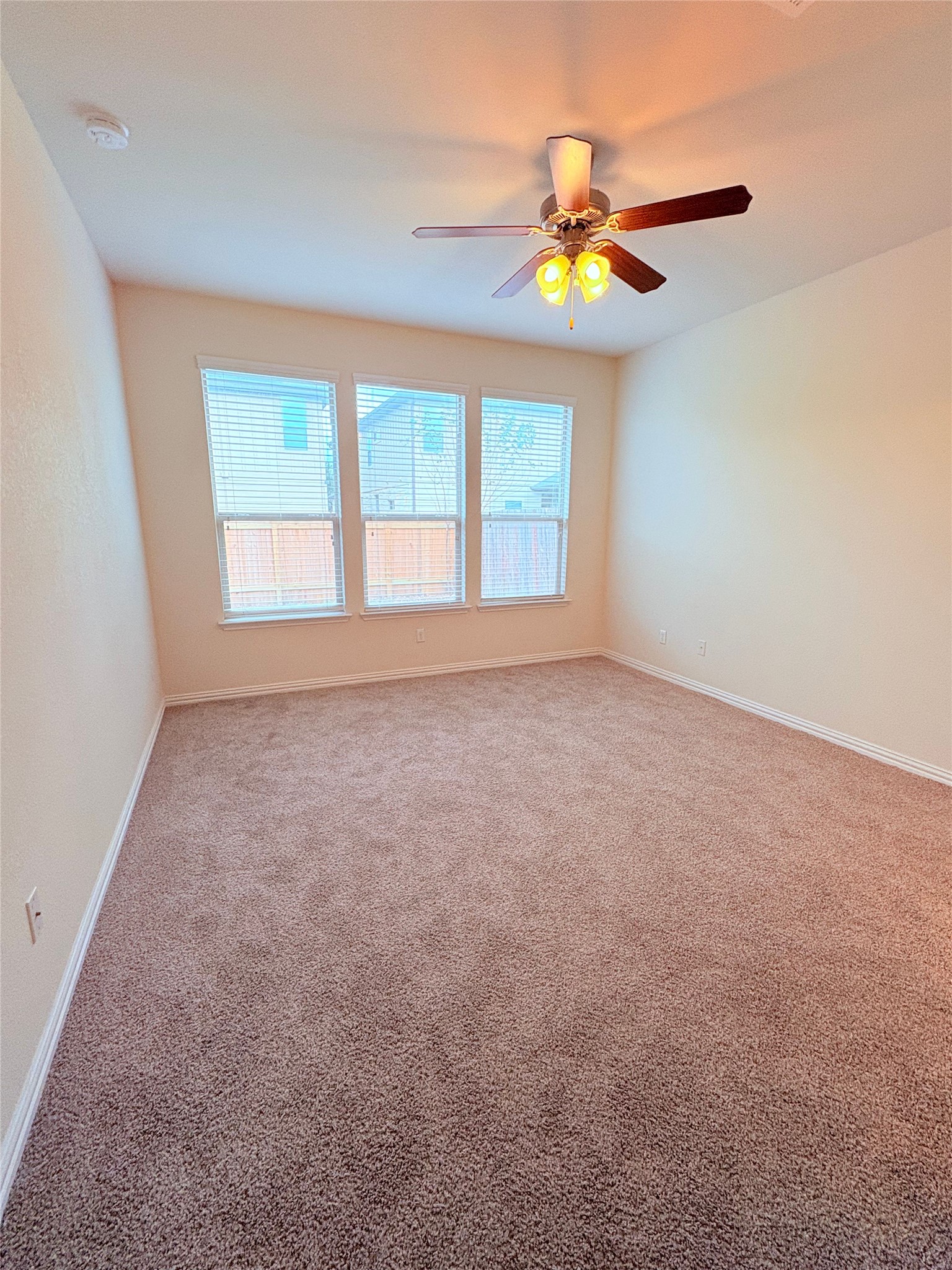 16029 Hampton Bliss Trace Austin, TX 78728 - Photo 8 of 15 a view of an empty room with a window