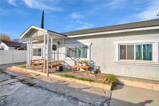 a front view of a house with a outdoor view