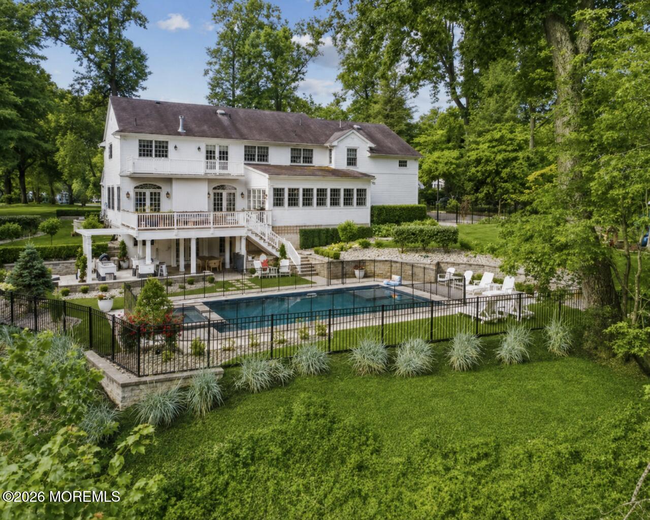 92 Tulip Lane Colts Neck, NJ 07722 - Photo 54 of 55 an aerial view of a house with a garden and plants