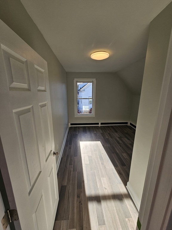 46 Dennis Street, Unit 3 Boston, MA 02119 - Photo 15 of 22 a view of entryway with wooden floor