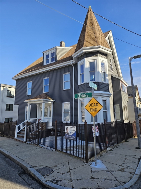 46 Dennis Street, Unit 3 Boston, MA 02119 - Photo 2 of 22 a view of the house with a swimming pool and sitting area