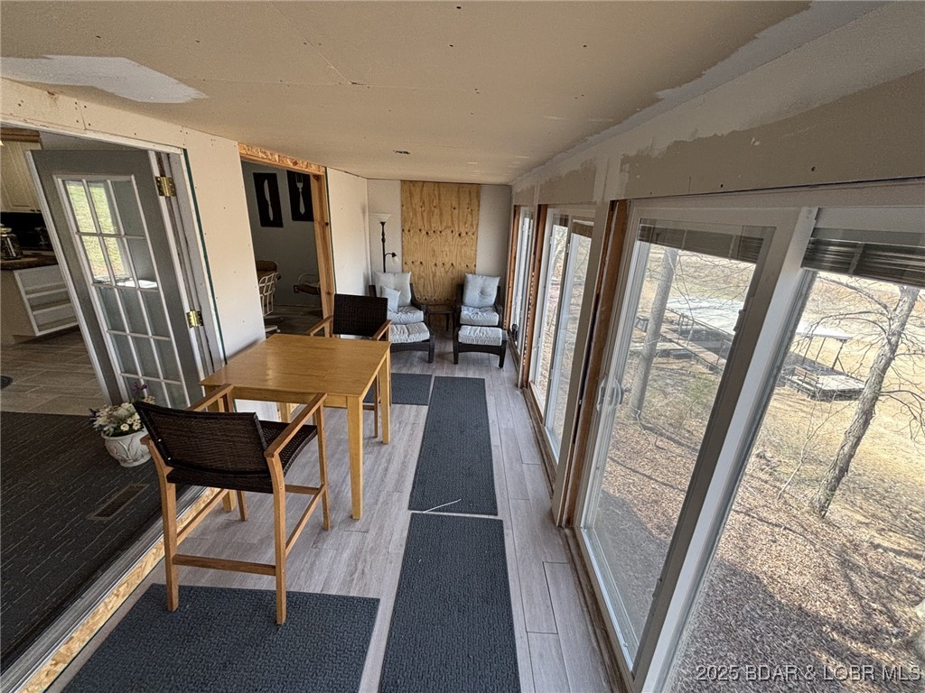 1265 Lick Creek Road Edwards, MO 65326 - Photo 13 of 27 Sunroom from back door