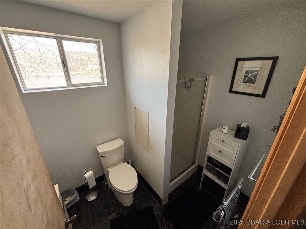 1265 Lick Creek Road Edwards, MO 65326 - Photo 15 of 27 main level bath walk in shower