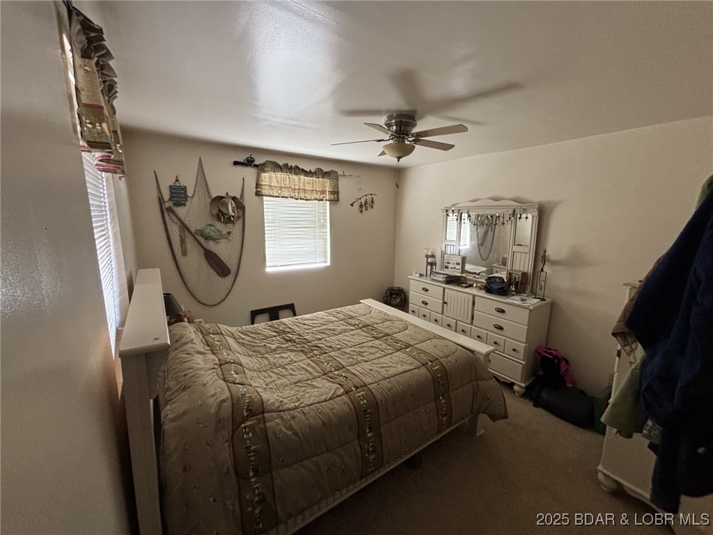1265 Lick Creek Road Edwards, MO 65326 - Photo 16 of 27 main level bedroom