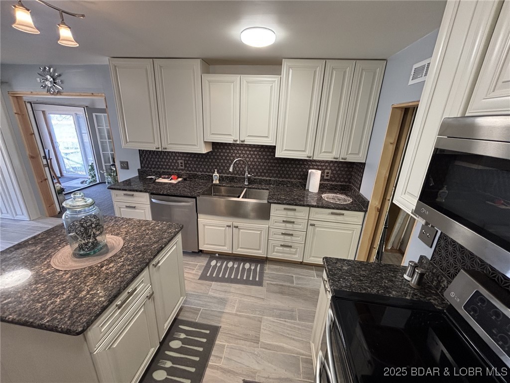 1265 Lick Creek Road Edwards, MO 65326 - Photo 5 of 27 island for more counterspace and storage