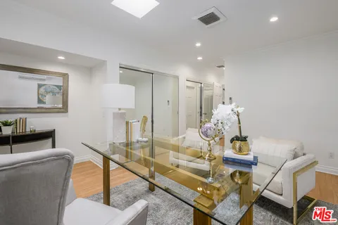 a living room with furniture and a couch