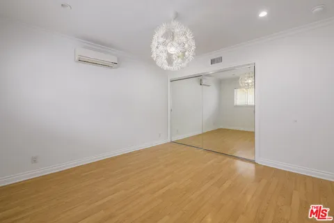 a view of a swimming pool with outdoor seating