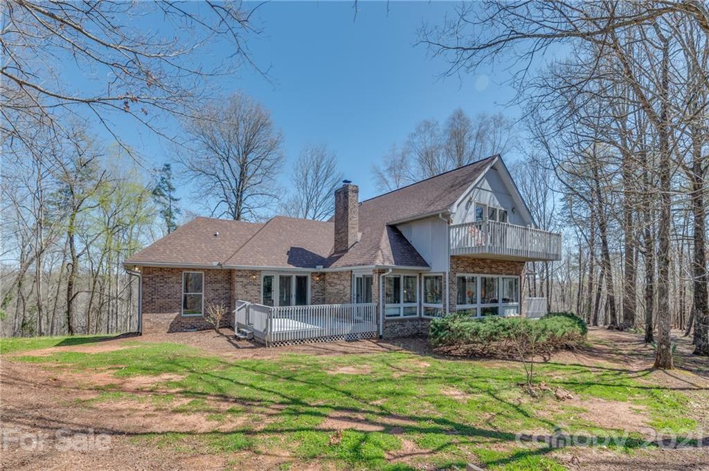 183 Alden Court Rutherfordton, NC 28139 - Photo 2 of 47 a front view of a house with yard porch and furniture