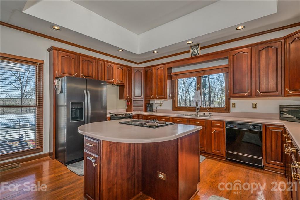183 Alden Court Rutherfordton, NC 28139 - Photo 11 of 47 a kitchen with stainless steel appliances granite countertop a sink stove and refrigerator