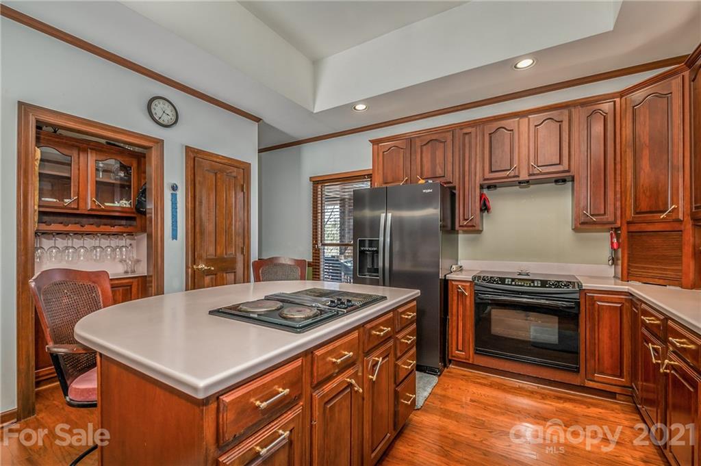 183 Alden Court Rutherfordton, NC 28139 - Photo 12 of 47 a kitchen with stainless steel appliances granite countertop a stove refrigerator sink and dishwasher