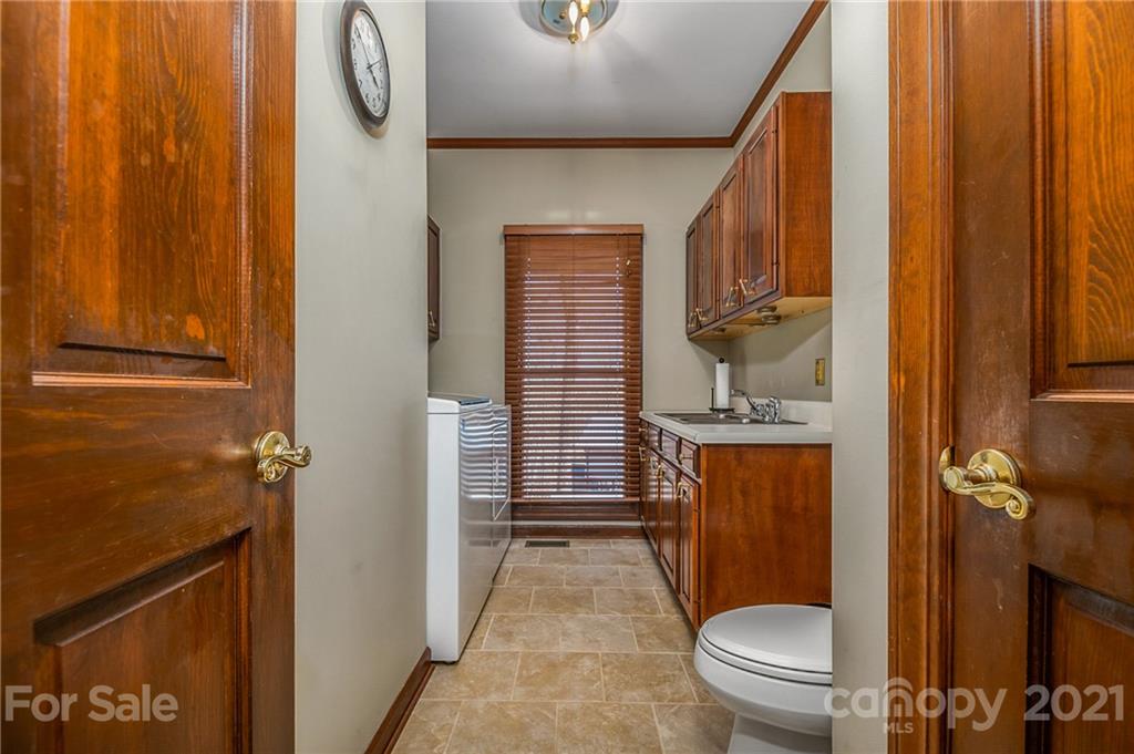 183 Alden Court Rutherfordton, NC 28139 - Photo 20 of 47 a bathroom with a granite countertop sink toilet and shower