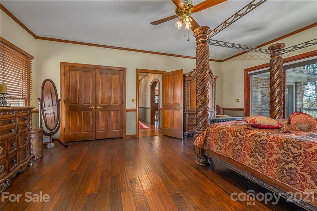 183 Alden Court Rutherfordton, NC 28139 - Photo 23 of 47 a bedroom with bed and wooden floor