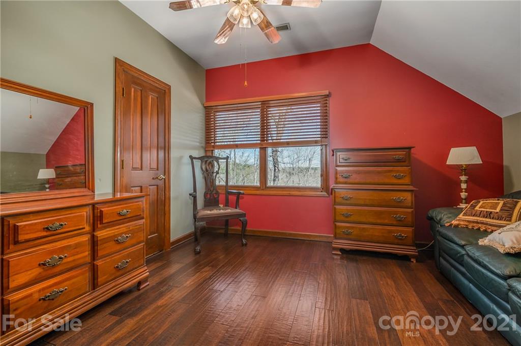 183 Alden Court Rutherfordton, NC 28139 - Photo 26 of 47 a view of room with window and wooden floor