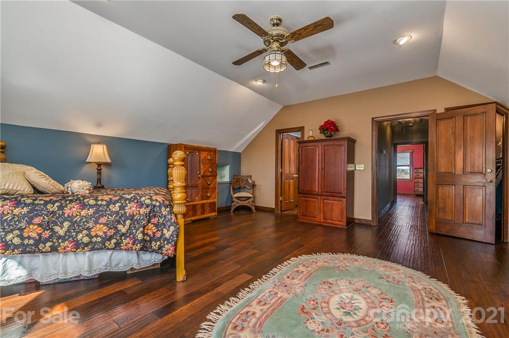 183 Alden Court Rutherfordton, NC 28139 - Photo 31 of 47 a bedroom with furniture and wooden floor
