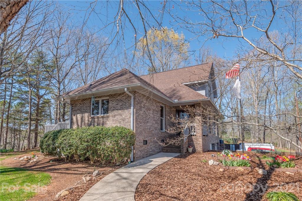 183 Alden Court Rutherfordton, NC 28139 - Photo 5 of 47 a front view of a house with garden