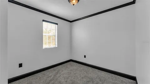 a bathroom with a tub and shower