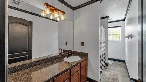 a view of a swimming pool with a yard