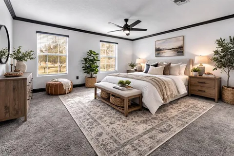 an aerial view of a house with a yard