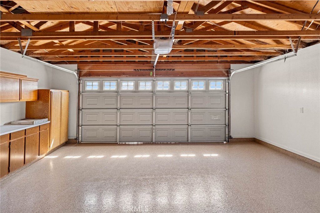 13904 Hidden Valley Road Victorville, CA 92395 - Photo 27 of 47 a view of a garage