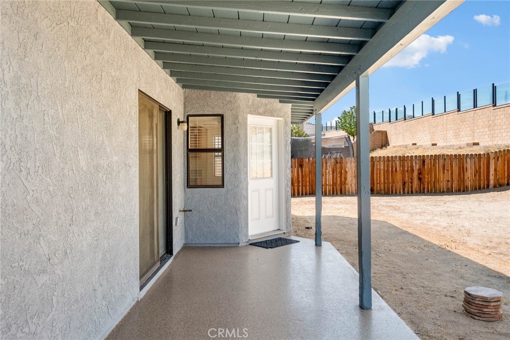 13904 Hidden Valley Road Victorville, CA 92395 - Photo 36 of 47 a view of a porch