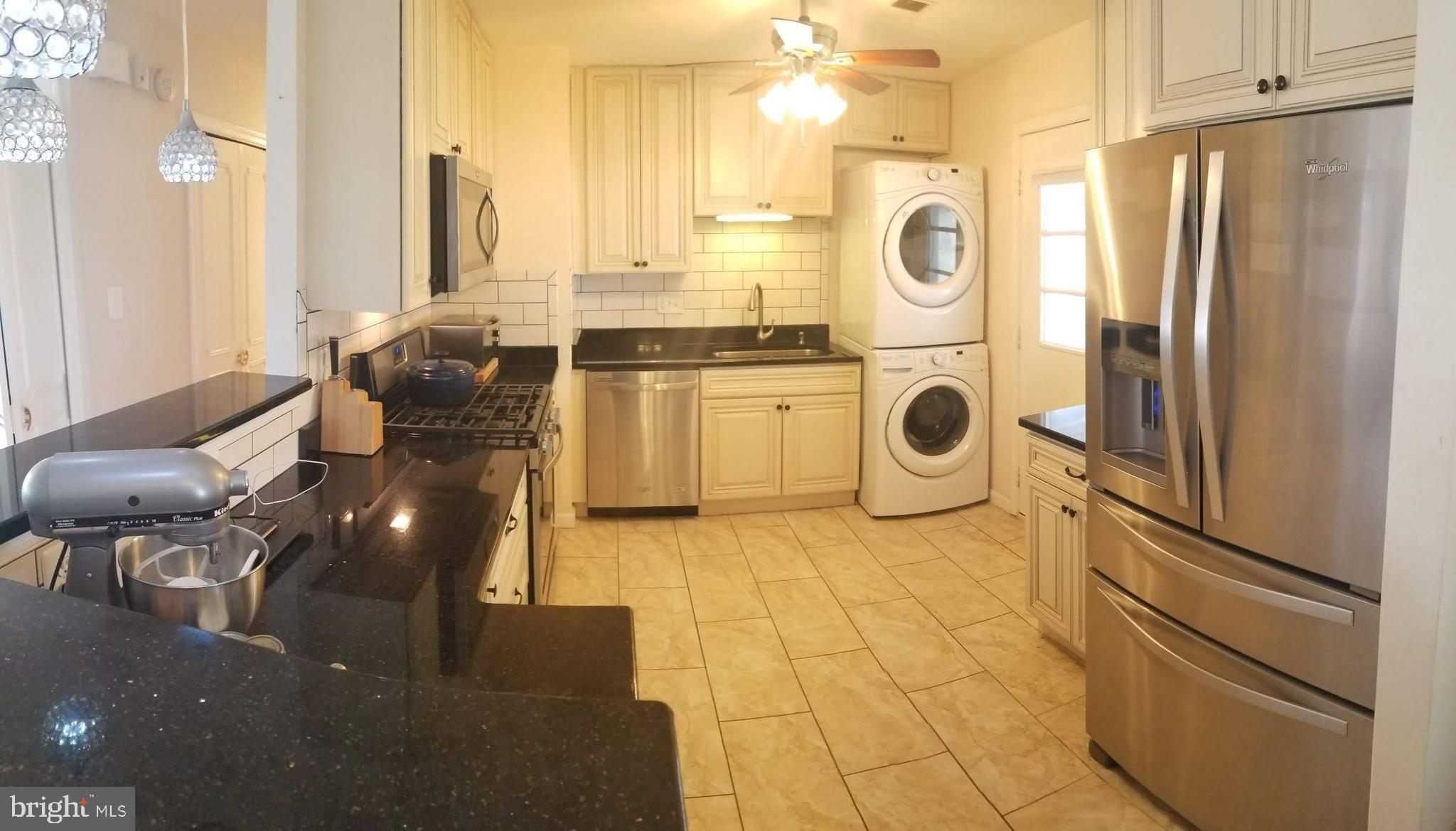 303 East Poplar Road Sterling, VA 20164 - Photo 5 of 12 REMODELED KITCHEN