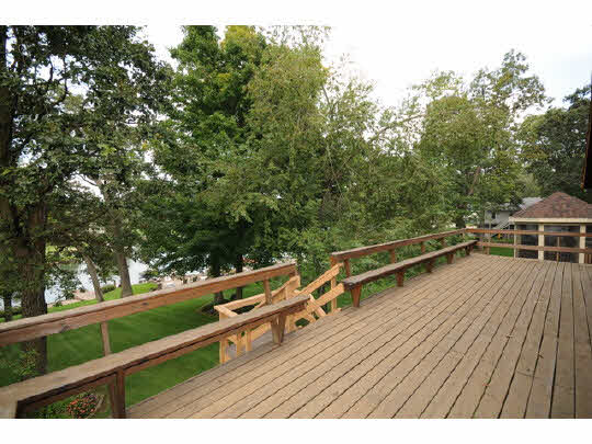 7 Lake Summerset Road Lake Summerset, IL 61019 - Photo 7 of 11 a view of balcony with wooden floor and outdoor space
