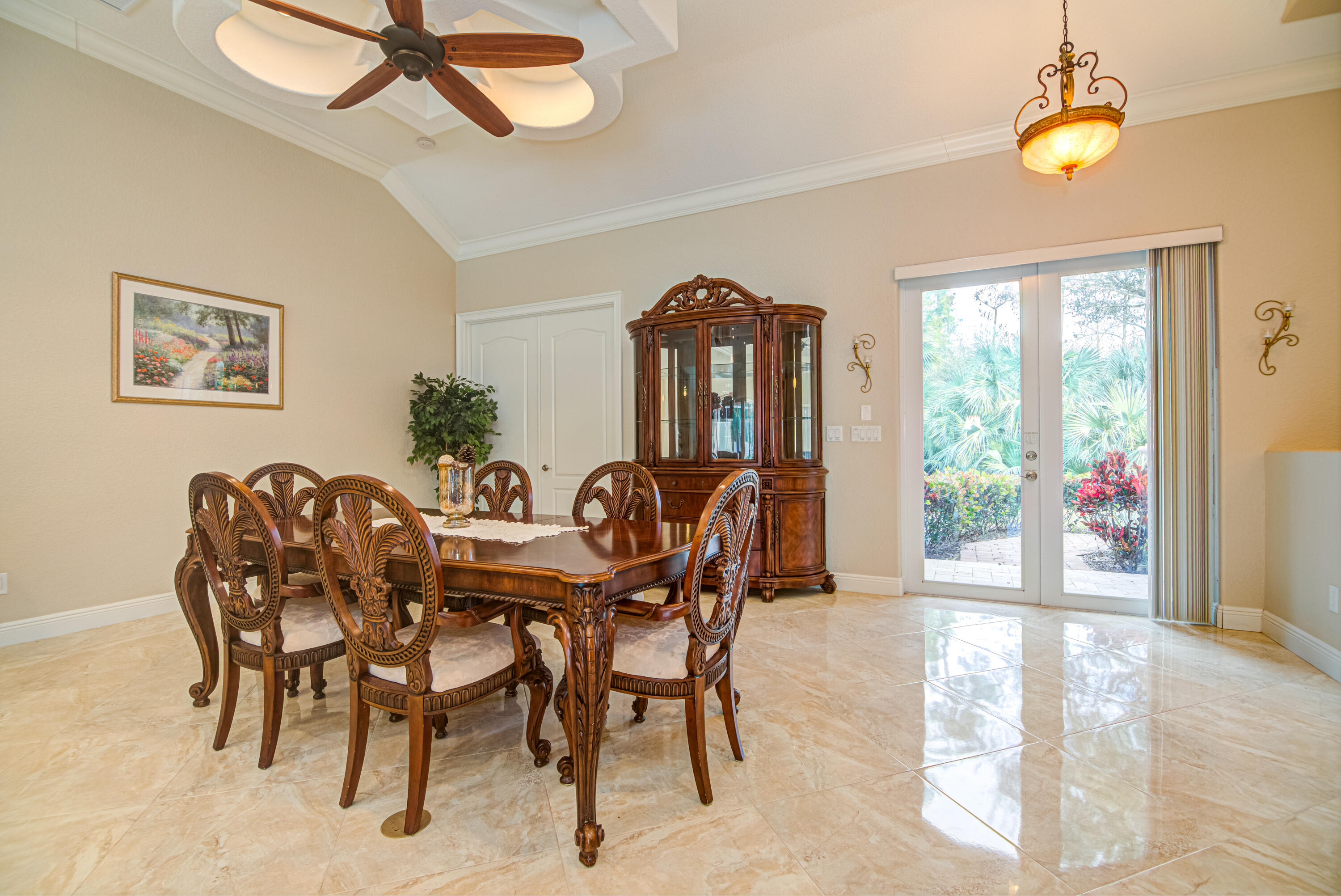 1059 E Road Loxahatchee, FL 33470 - Photo 13 of 82 a view of a dining room with furniture and a floor to ceiling window