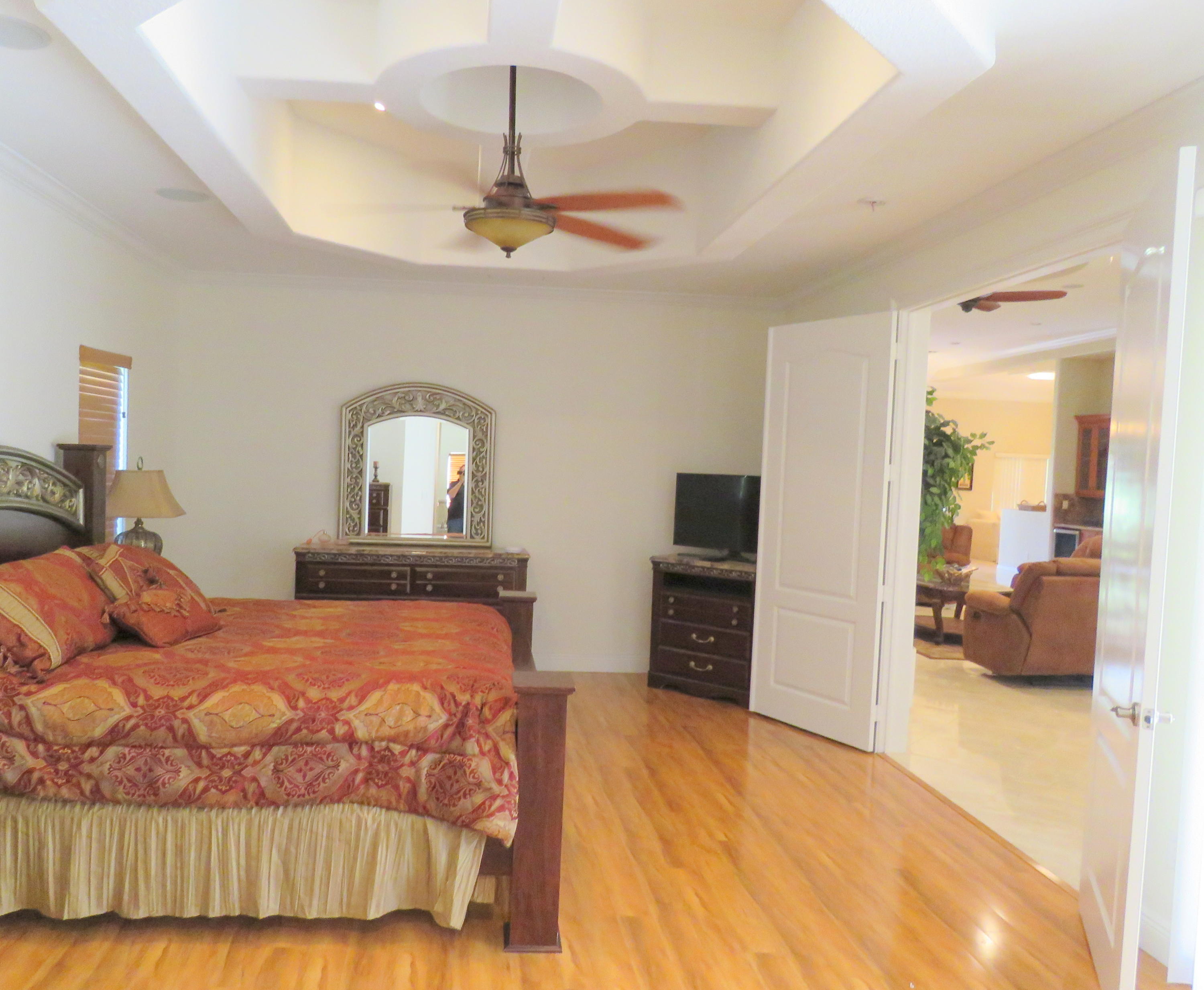 1059 E Road Loxahatchee, FL 33470 - Photo 19 of 82 MASTER BEDROOM ONE