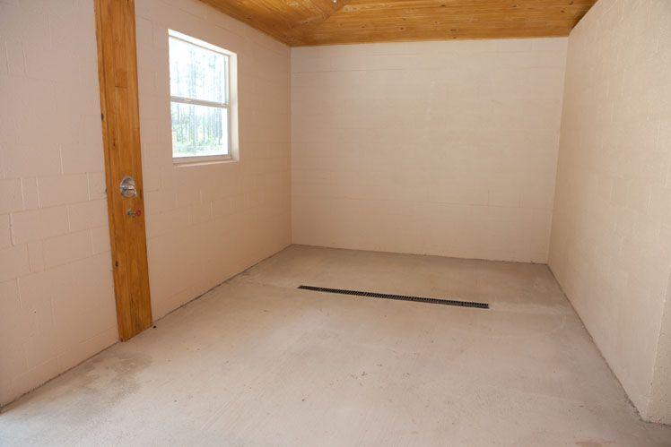 1059 E Road Loxahatchee, FL 33470 - Photo 44 of 82 an empty room with a window