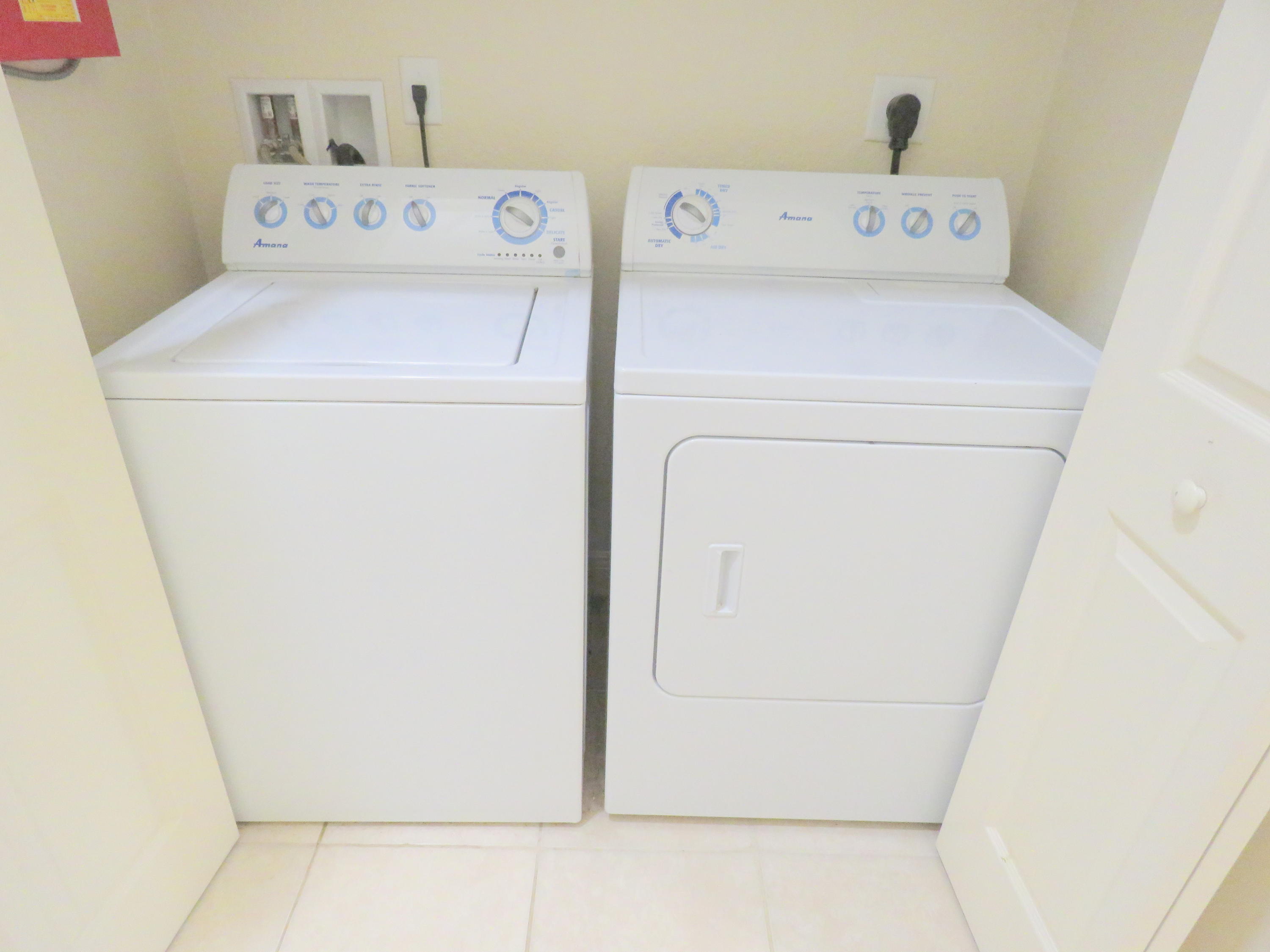1059 E Road Loxahatchee, FL 33470 - Photo 62 of 82 a utility room with dryer and washer