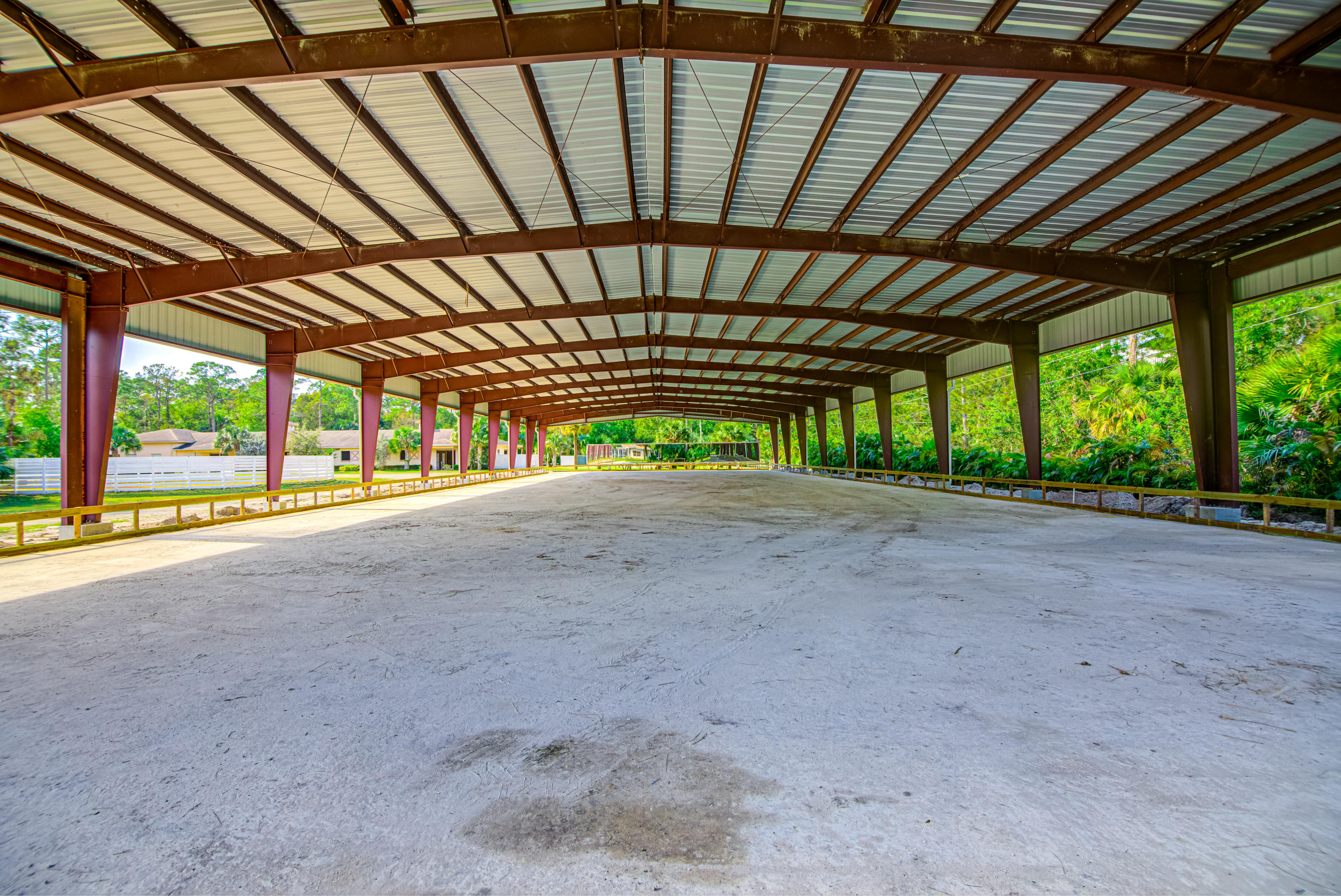 1059 E Road Loxahatchee, FL 33470 - Photo 65 of 82 a view of an empty room with a porch