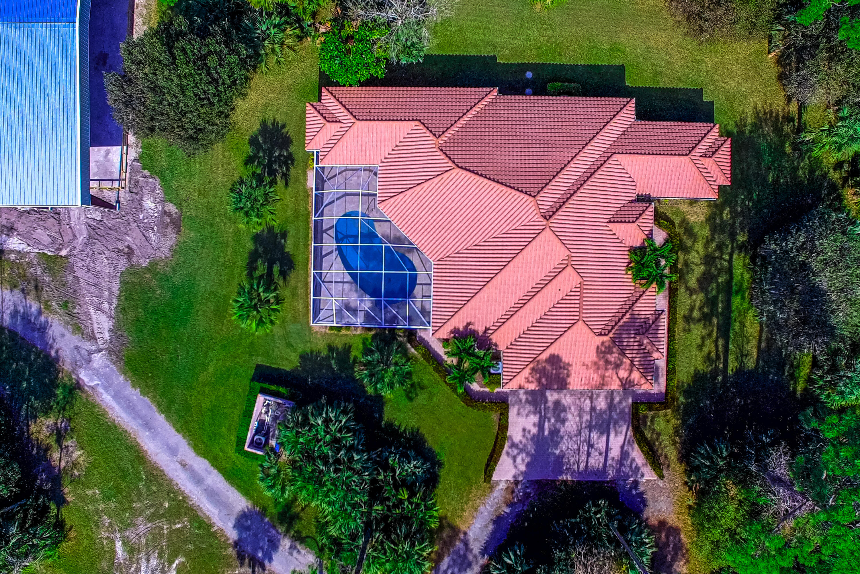 1059 E Road Loxahatchee, FL 33470 - Photo 7 of 82 an aerial view of a house with a yard