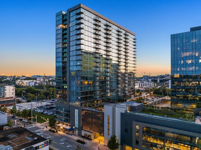 a view of a city with tall buildings