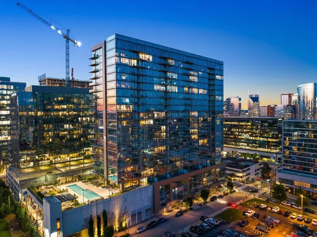 a view of a city with tall buildings