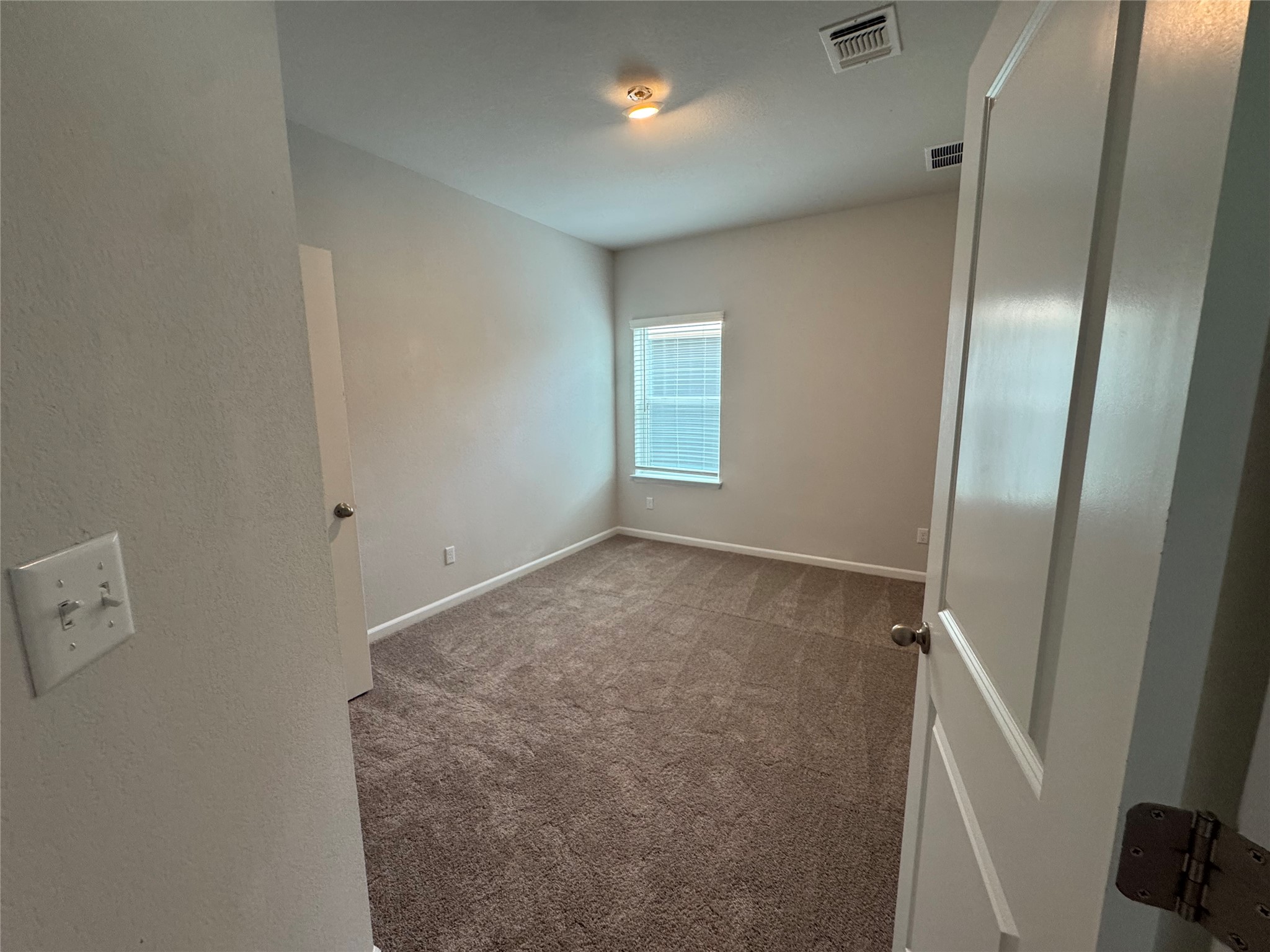 3000 Chisholm Trail Road, Unit 41 Round Rock, TX 78681 - Photo 17 of 28 A spacious, naturally illuminated room offers a comfortable and neutral canvas for personalization.