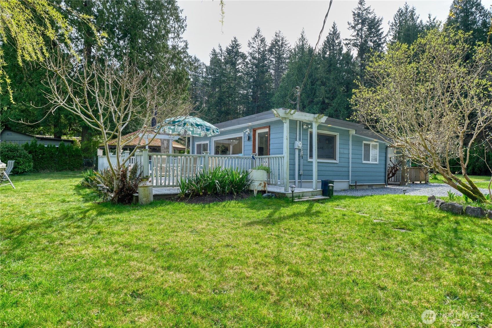 1871 Johnson Road Point Roberts, WA 98281 - Photo 15 of 36 a front view of house with yard and green space