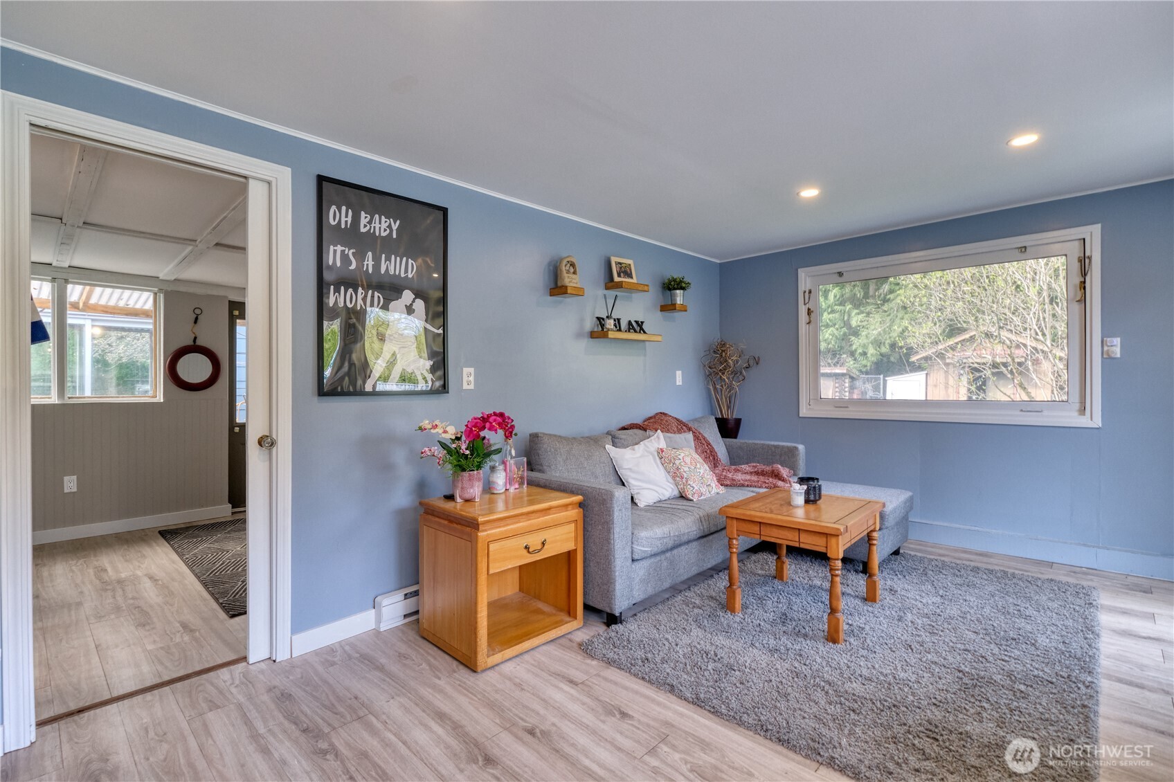 1871 Johnson Road Point Roberts, WA 98281 - Photo 6 of 36 a living room with furniture a window and a flat screen tv
